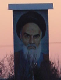 Image of Khomeini viewed in the distance from his tomb in Tehran 