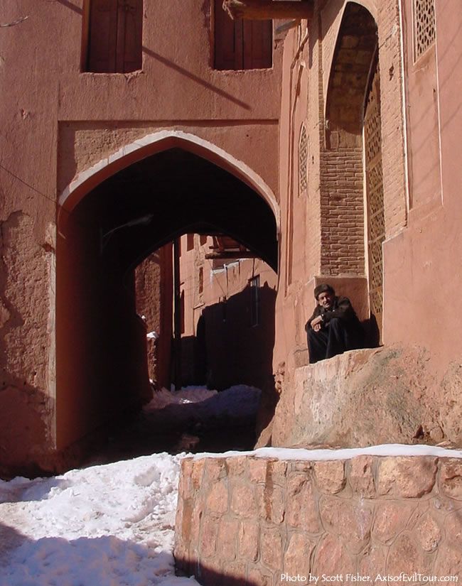 Old man warming himself in the sun, Abyaneh